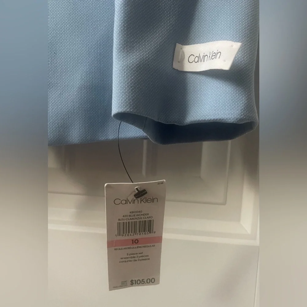 Calvin Klein 
Boys 3 piece suit 
NWT 
Size 10 jacket / size 12 vest and pants - Picture 2 of 6